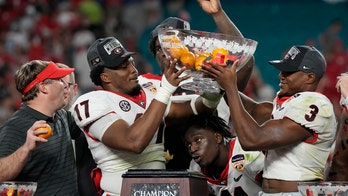 Georgia routs Michigan 34-11, will face Alabama in title game