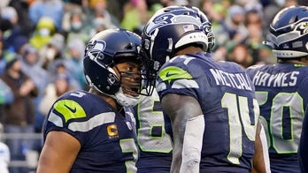 Penny, Metcalf lead Seahawks to 51-29 blowout of Lions