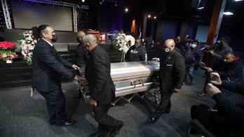 Los Angles girl shot and killed by police in dressing room remembered at funeral
