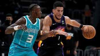 Devin Booker scores 24 points, depleted Suns rout Hornets