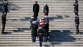 Body of Harry Reid, former Senate majority leader, lies in state at US Capitol