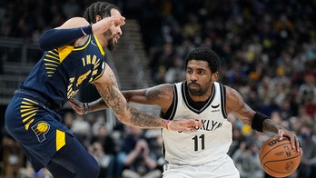Kyrie Irving lifts Nets in season debut