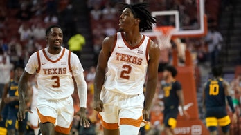 Marcus Carr leads No. 17 Texas past short-handed West Virginia