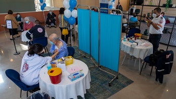 COVID-19 omicron variant sets record for new infections in Israel