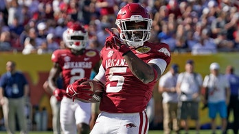 Arkansas runs over Penn State in Outback Bowl, 24-10; SEC wins third straight bowl game