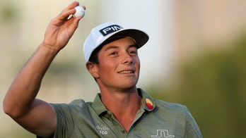 Viktor Hovland beats Richard Bland in playoff to win Dubai Desert Classic