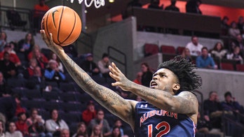 No. 4 Auburn wins 13th straight, beats Ole Miss