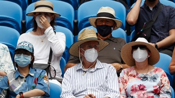 Australia reports record COVID-19 deaths, hospitals under pressure