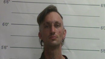 New Orleans police arrest man in relation to frozen dismembered body found on bus