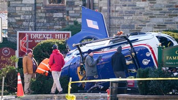 Investigators probe wreckage of crashed medical helicopter