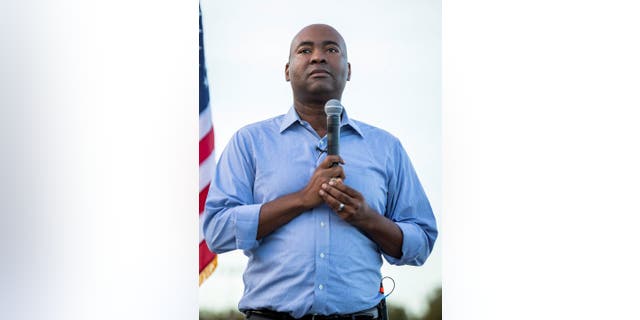 Democrats seek to 'sell' achievements ahead of tough midterms 2 Democratic National Committee Chairman Jaime Harrison during his U.S. Senate race during a drive-in campaign rally at Wilson High School in Florence, SC on October 24, 2020.
