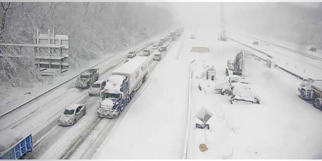 Vehicles are seen on an icy stretch of Interstate 95 closed as a storm blankets the U.S. region in snow, near Fredericksburg, Virginia, U.S. January 3, 2022. Picture taken January 3, 2022. Virginia Department of Transportation/Handout via REUTERS