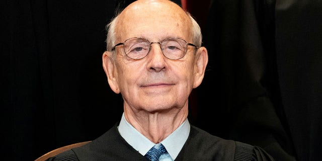 Associate Justice Stephen Breyer poses during a group photo of the Justices at the Supreme Court in Washington, April 23, 2021.