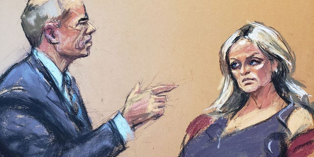 Former attorney Michael Avenatti, representing himself, cross-examines witness Stormy Daniels during his criminal trial at the United States Courthouse in the Manhattan borough of New York City, U.S., January 27, 2022, in this courtroom sketch. 