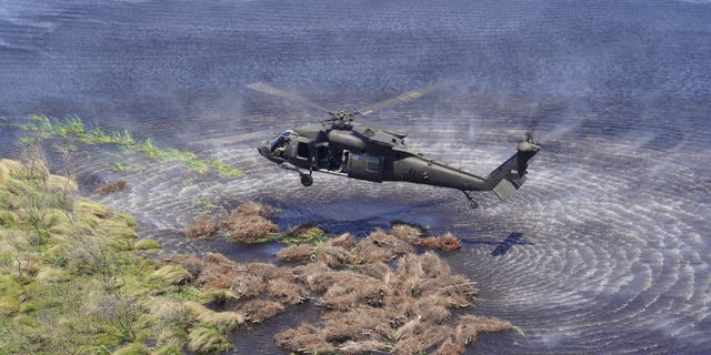 In two decades, the National Guard has added about 200 football fields of marshland to Louisiana's coast.