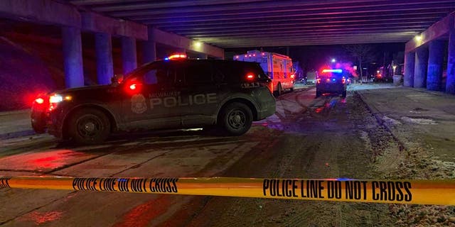 Law enforcement presence near 64th and Adler streets in Milwaukee, Wisconsin, early Wednesday where a sheriff's deputy was shot during a foot pursuit. 