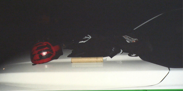 Smith's alleged backpack, helmet, and pipe-type explosive that were found at the scene. (Credit: Pinellas County Sheriff's Office)