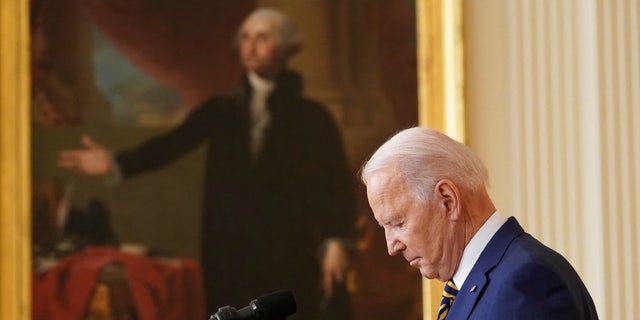 Amerikaanse. President Joe Biden holds a formal news conference in the East Room of the White House, in Washington, D.C., VS, Januarie 19, 2022. REUTERS/Kevin Lamarque