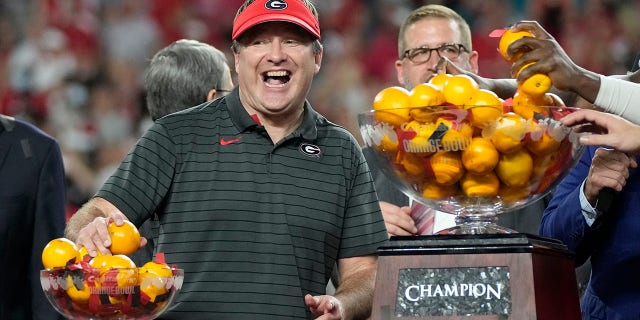 Georgia head coach Kirby Smart celebrates after winning the Orange Bowl NCAA College Football Playoff semifinal game against Michigan, Friday, Dec. 31, 2021, in Miami Gardens, Fla. Georgia won 34-11.