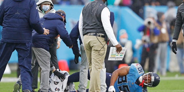 Tennessee Titans tight end MyCole Pruitt (85) is attended to after being injured in the first half of an NFL football game against the Miami Dolphins Sunday, Jan. 2, 2022, a Nashville, Tenn.