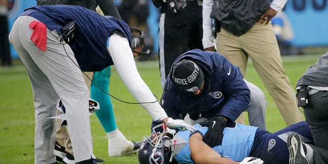 Tennessee Titans tight end MyCole Pruitt is attended to after being injured in the first half of an NFL football game against the Miami Dolphins Sunday, Jan. 2, 2022, a Nashville, Tenn.