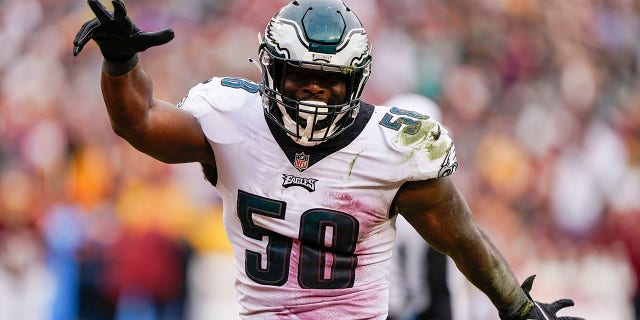 Philadelphia Eagles outside linebacker Genard Avery (58) celebrates after sacking Washington Football Team quarterback Taylor Heinicke (4) during the second half of an NFL football game, Sunday, Jan. 2, 2022, in Landover, Md.