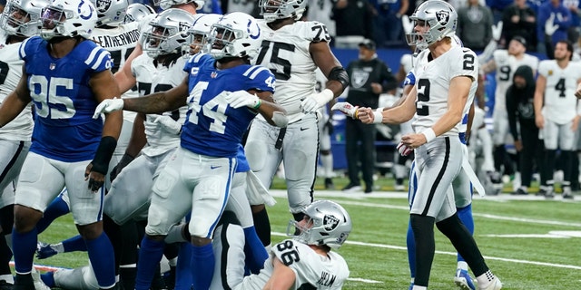 Las Vegas Raiders kicker Daniel Carlson (2) celebrates after kicking a 33-yard field goal on the final play of an NFL football game against the Indianapolis Colts, Sunday, Jan. 2, 2022, in Indianapolis. The Raiders won 23-20.