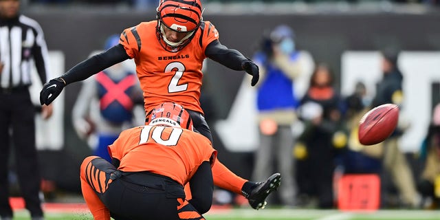 Cincinnati Bengals kicker Evan McPherson (2) scores a game-winning 20-yard field goal during the second half of an NFL football game against the Kansas City Chiefs, Sunday, Jan. 2, 2022, in Cincinnati.