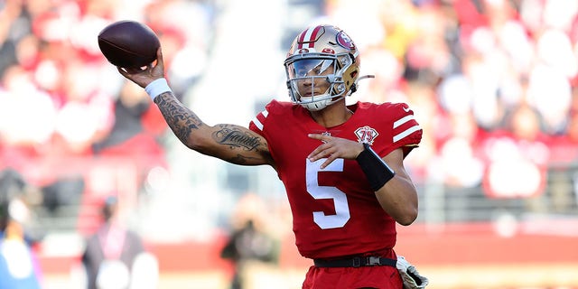 San Francisco 49ers quarterback Trey Lance (5) passes against the Houston Texans during the first half of an NFL football game in Santa Clara, Calif., Sunday, Jan.  2, 2022.