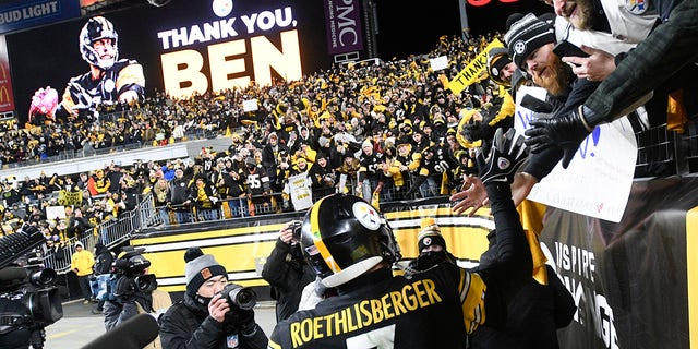 Pittsburgh Steelers quarterback Ben Roethlisberger greets fans after a game against the Cleveland Browns Jan. 3, 2022, in Pittsburgh. 