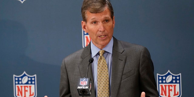 Allen Sills, chief medical officer for the NFL, speaks to reporters during the NFL football owners meeting in New York City, Oct. 26, 2021.