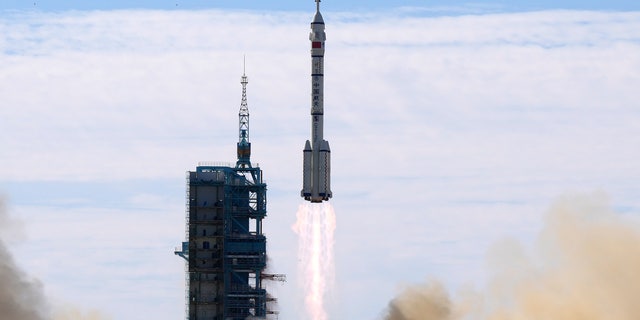 A Long March-2F Y12 rocket carrying a crew of Chinese astronauts in a Shenzhou-12 spaceship lifts off at the Jiuquan Satellite Launch Center in Jiuquan in northwestern China, Thursday, June 17, 2021. (AP Photo/Ng Han Guan, File)