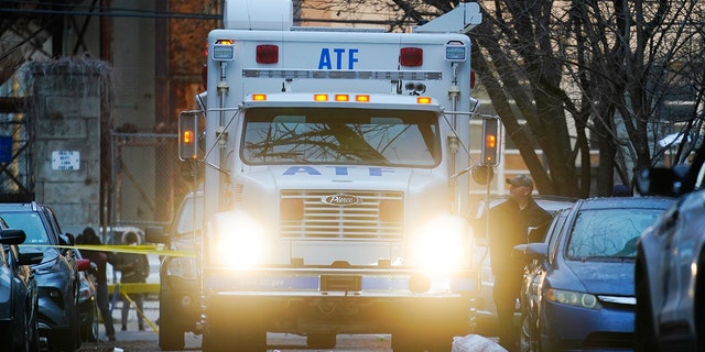 A response vehicle is parked near the scene of Wednesday's deadly fire in the Fairmount neighborhood of Philadelphia., Thursday, Jan. 6, 2022. (AP Photo/Matt Rourke)