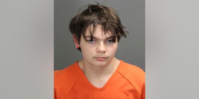 Ethan Crumbley, who is charged as an adult with murder and terrorism for a shooting that killed four fellow students and injured more at Oxford High School in Oxford, Mich. Pleaded not guilty Wednesday.