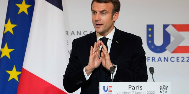 French President Emmanuel Macron speaks as he participates in a media conference with European Commission President Ursula von der Leyen after a meeting at the Elysee Palace in Paris, France, Friday, Jan. 7, 2022. (AP Photo/Michel Euler, Pool)