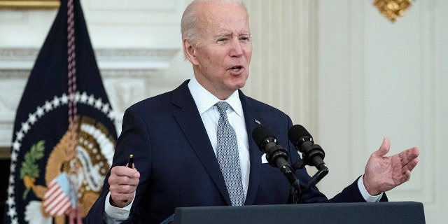 President Biden speaks about the 2021 jobs report in the State Dining Room of the White House, Friday, Jan. 7, 2022, in Washington.