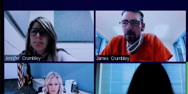 This image from 52-3 District Court shows James and Jennifer Crumbley in a Zoom hearing in Rochester Hills, Mich., Friday, Jan. 7, 2022. (AP Photo/Carlos Osorio)