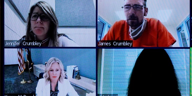 This image from 52-3 District Court shows James and Jennifer Crumbley in a Zoom hearing in Rochester Hills, Mich., Friday, Jan. 7, 2022. (AP Photo/Carlos Osorio)