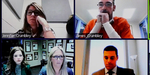 This image from 52-3 District Court shows James and Jennifer Crumbley in a Zoom hearing in Rochester Hills, Mich., Friday, Jan. 7, 2022. (AP Photo/Carlos Osorio)