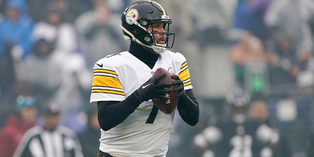 Pittsburgh Steelers quarterback Ben Roethlisberger looks to pass against the Baltimore Ravens during the first half of an NFL football game, Sunday, Jan. 9, 2022, in Baltimore.