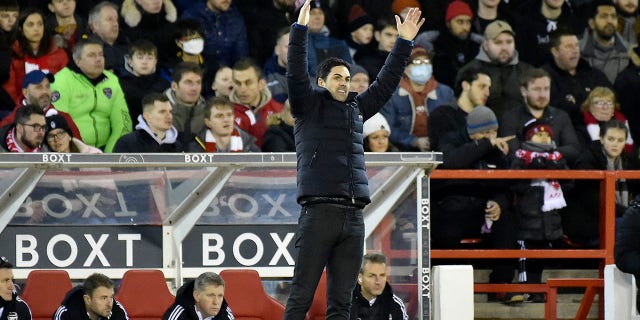 Arsenal's manager Mikel Arteta gestures during the English FA Cup third round soccer match between Nottingham Forest and Arsenal at the City Ground, Nottingham, England, Sunday, Jan. 9, 2022.
