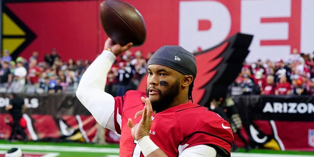 Arizona Cardinals quarterback Kyler Murray warms up prior to an NFL football game against the Seattle Seahawks Sunday, Jan. 9, 2022, in Glendale, Ariz.