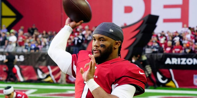 Arizona Cardinals quarterback Kyler Murray warms up prior to an NFL football game against the Seattle Seahawks Sunday, Jan. 9, 2022, in Glendale, Ariz.
