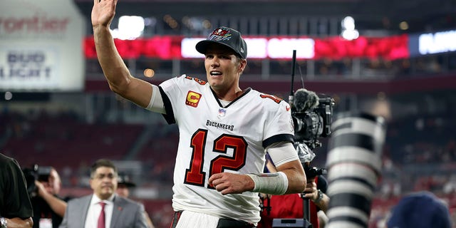 Tampa Bay Buccaneers quarterback Tom Brady (12) waves to fans after the team defeated the Carolina Panthers during an NFL football game Sunday, Jan. 9, 2022, in Tampa, Fla.