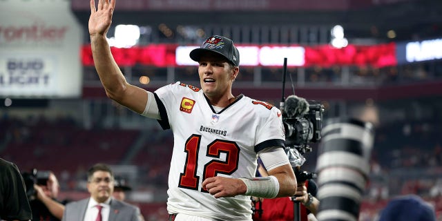 Tampa Bay Buccaneers quarterback Tom Brady (12) waves to fans after the team defeated the Carolina Panthers during an NFL football game Sunday, Jan. 9, 2022, in Tampa, Fla.