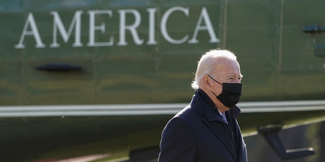 President Joe Biden walks to the Oval Office of the White House after stepping off Marine One, Monday, Jan. 10, 2022, in Washington.