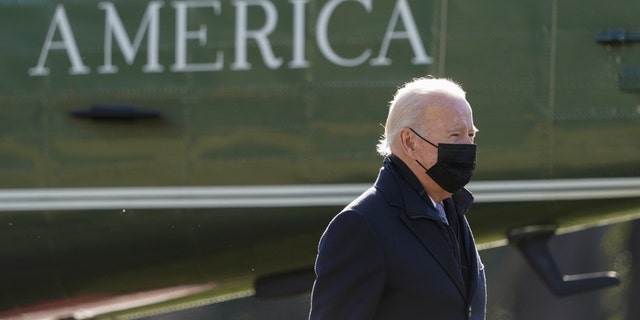 President Joe Biden walks to the Oval Office of the White House after stepping off Marine One, Monday, Jan. 10, 2022, in Washington.