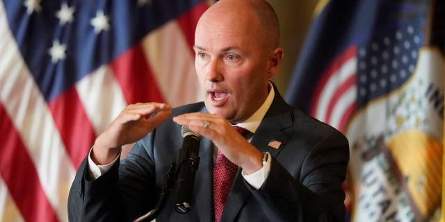 Gov. Spencer Cox speaks during a news conference in Salt Lake City.