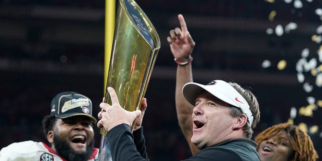 Georgia head coach Kirby Smart celebrates after the College Football Playoff championship football game against Alabama Tuesday, Jan. 11, 2022, in Indianapolis. Georgia won 33-18.