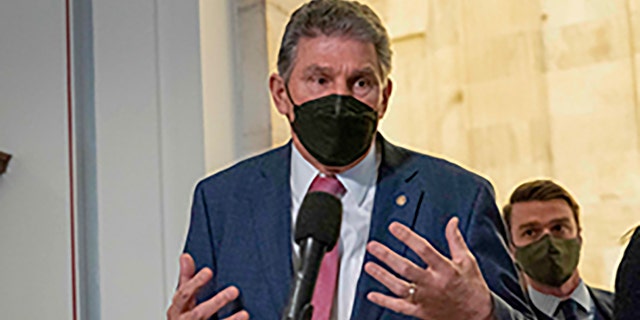 Sen. Joe Manchin speaks to the media after a Senate Democrats luncheon on Capitol Hill, Jan. 13, 2022.